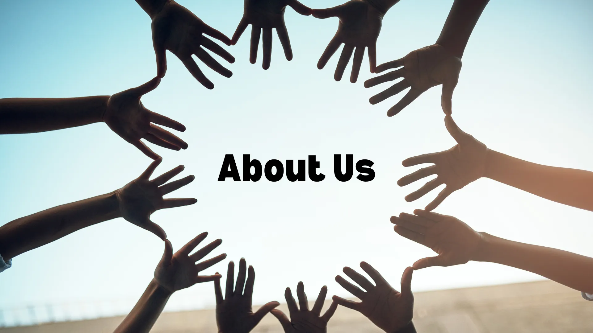 Hands forming a circle with 'About Us' text in the centre