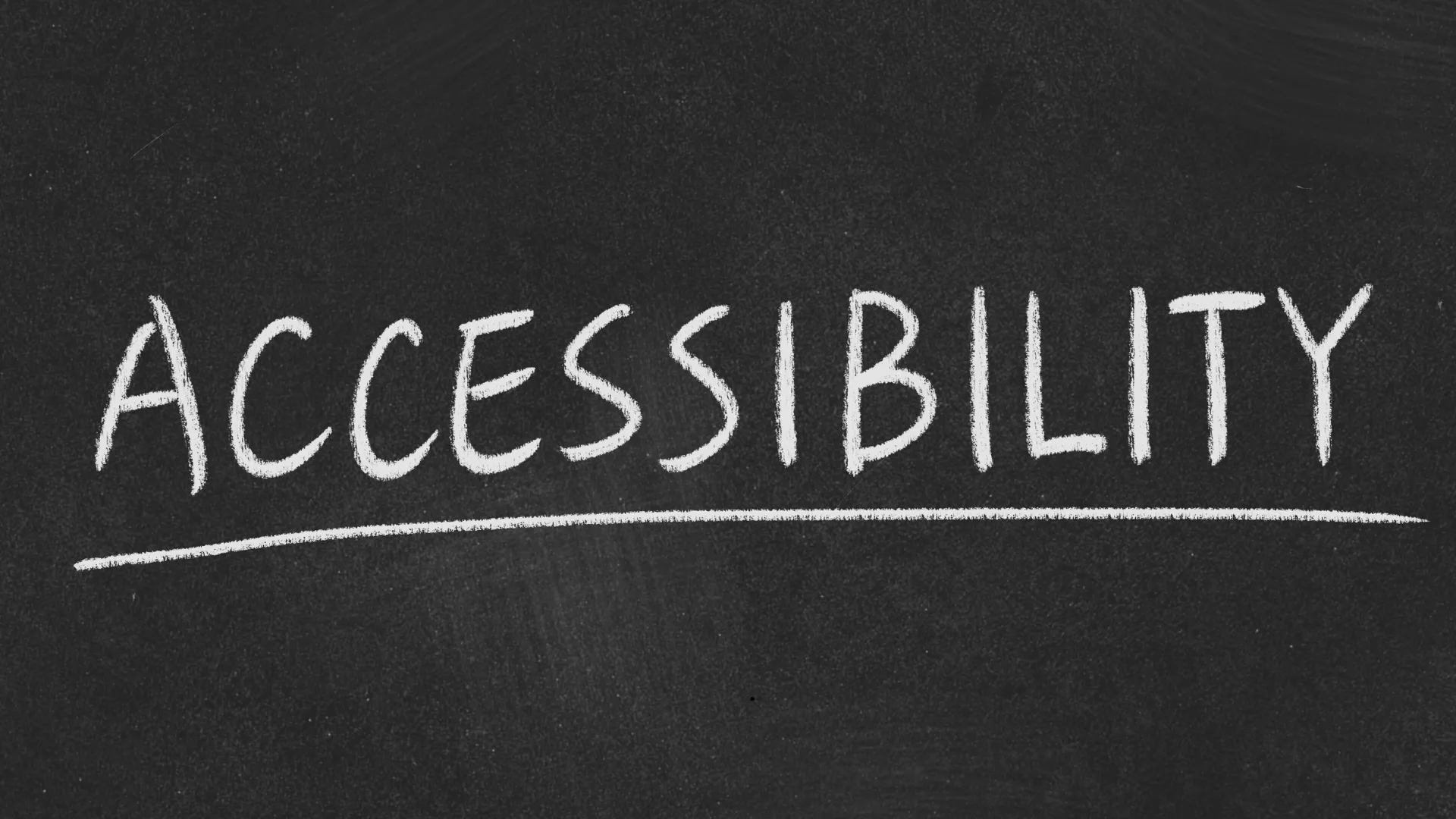 ACCESSIBILITY written in white chalk on a blackboard
