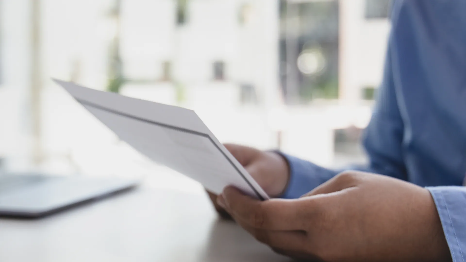 Person holding an application form