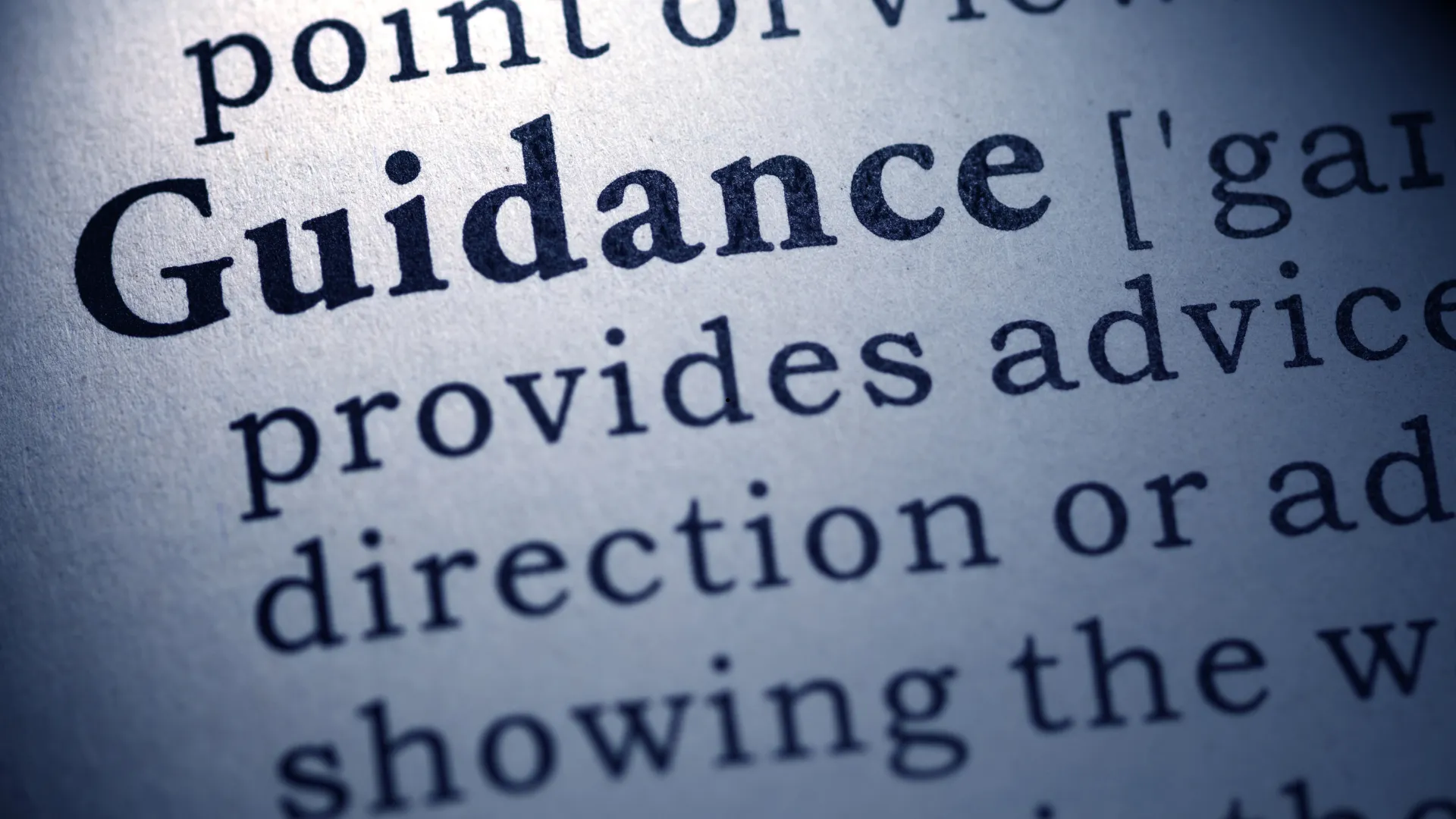 Close-up of a dictionary page showing the word 'Guidance' and its definition