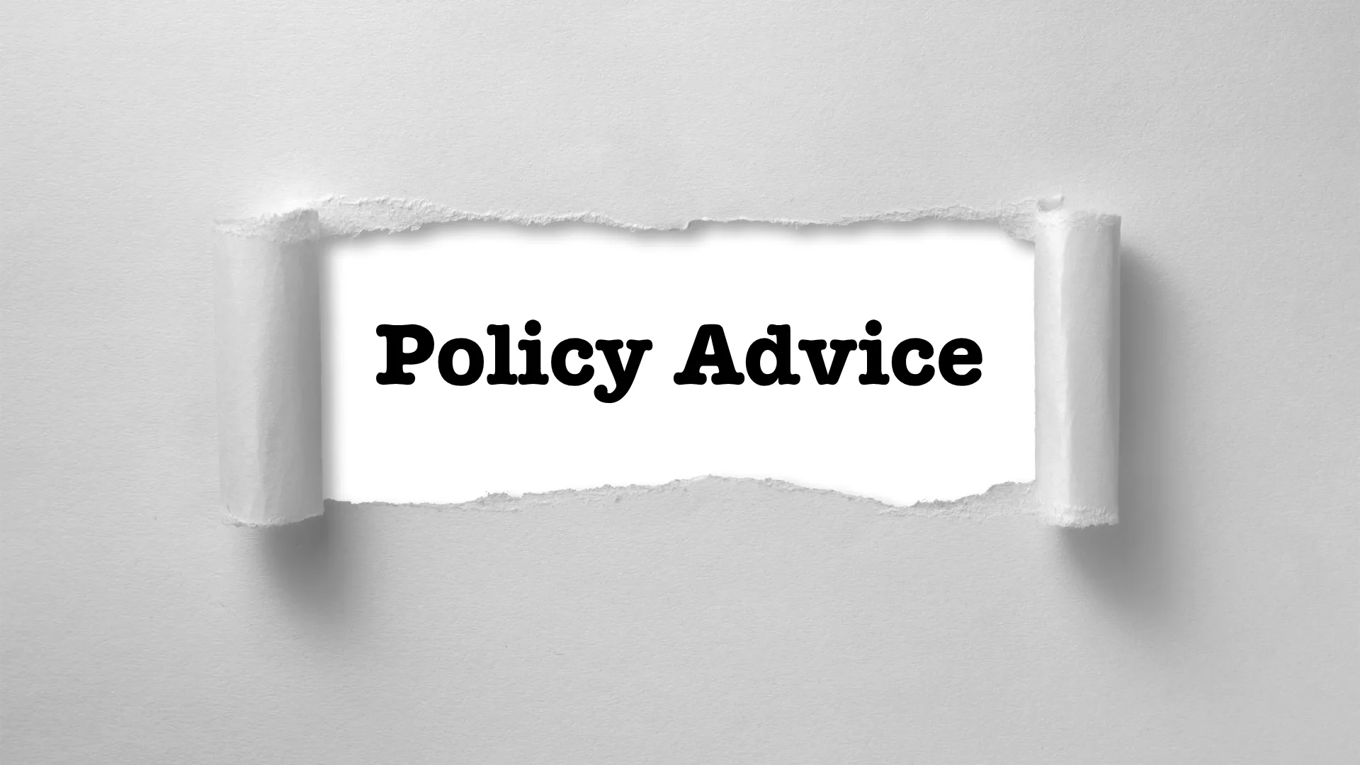 "Policy Advice text on torn paper background"