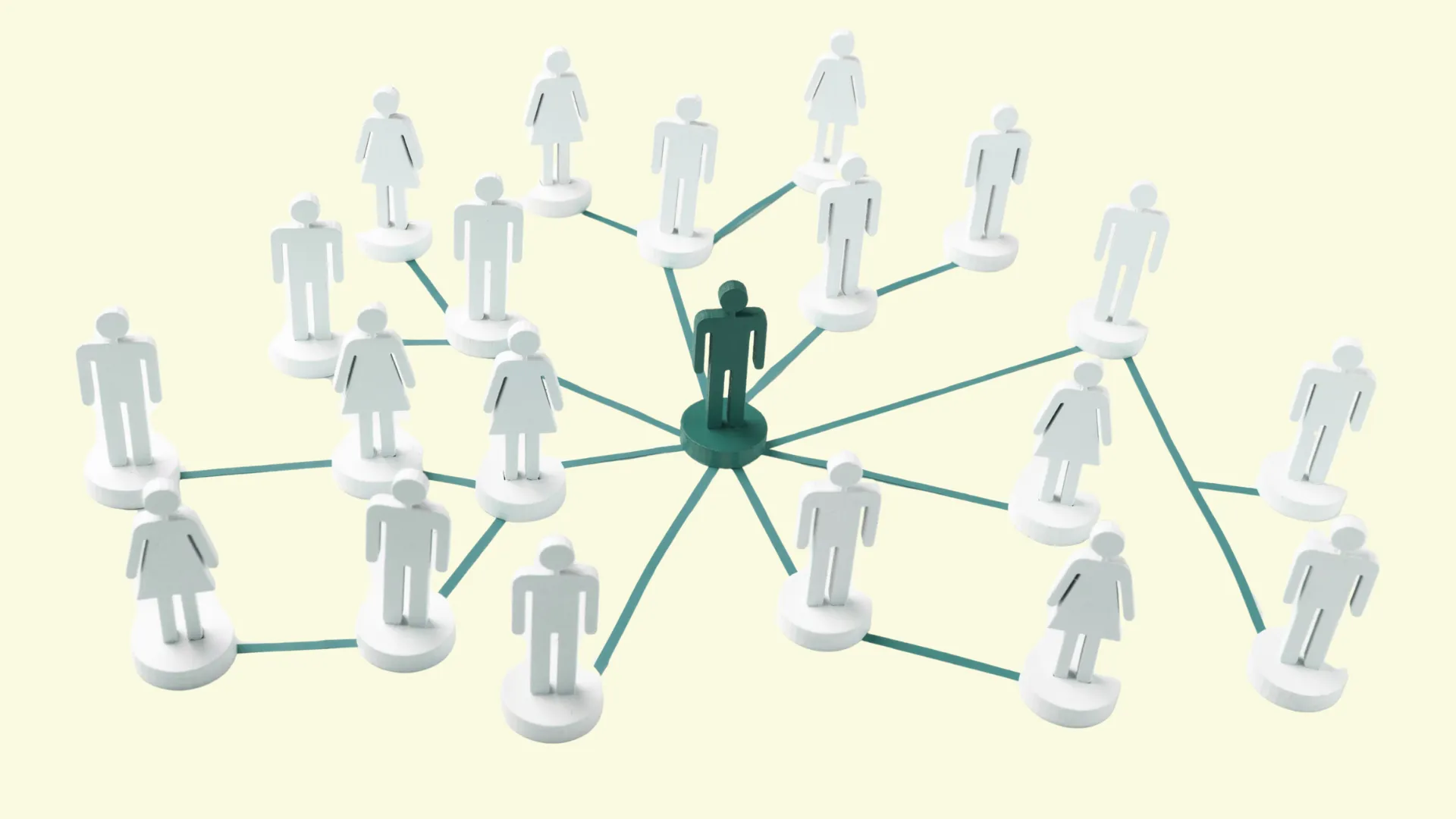 A green central figure connected to multiple white surrounding figures, representing the regional team