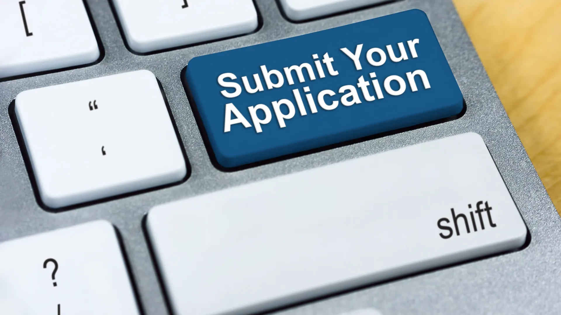 Keyboard with a 'Submit Your Application' key