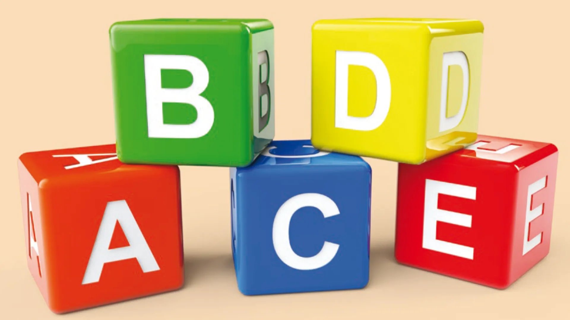 Colourful alphabet blocks arranged in a stack with letters A, B, C, D, and E in various colours including red, green, blue, yellow, and orange