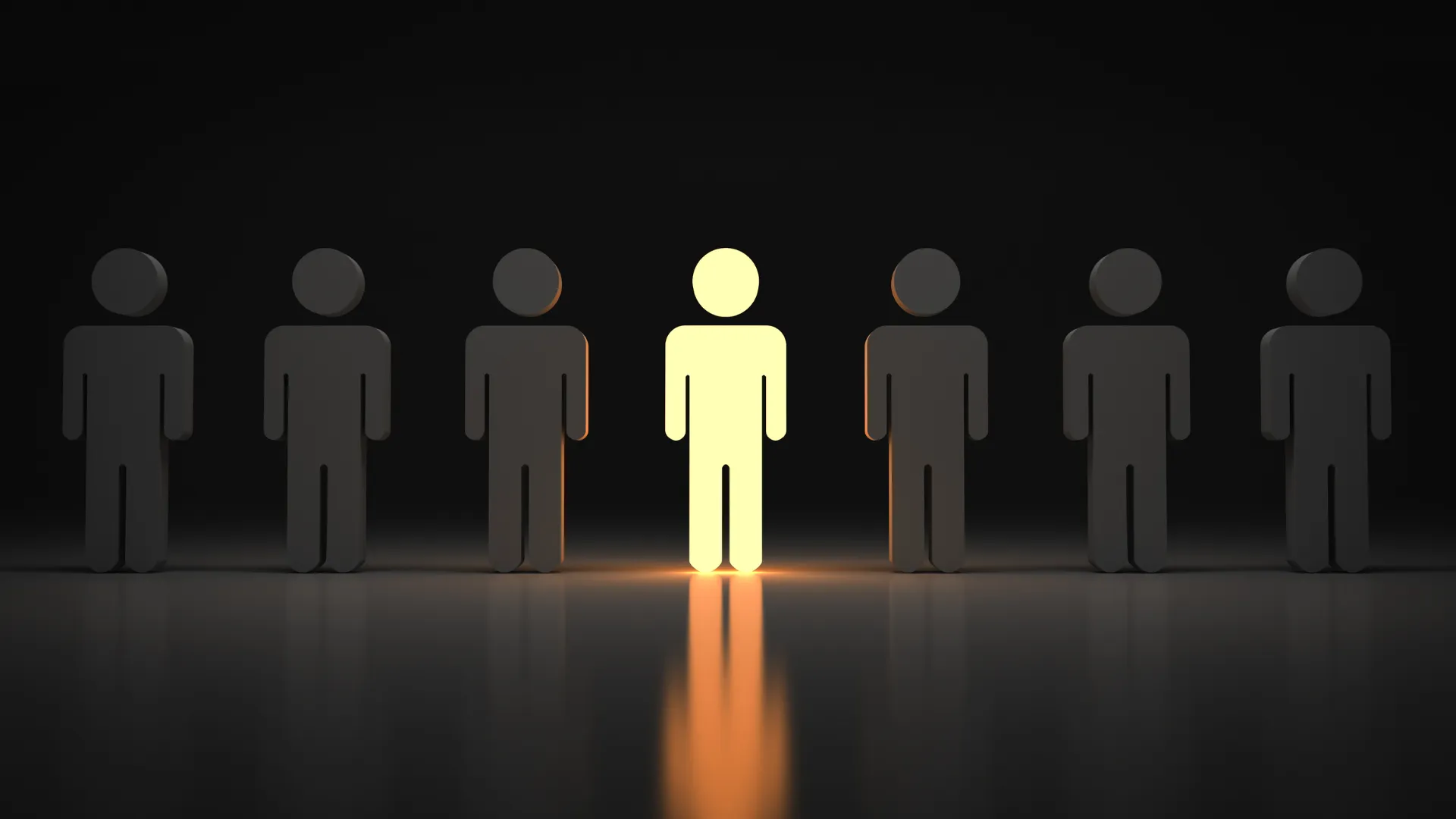 Row of dark human figures with one glowing figure in the center standing out