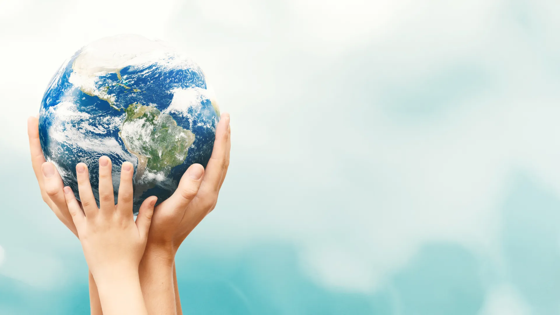 Hands holding Earth